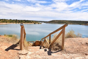Wooden stairs down to the Peñarroya reservoir, Ruidera lagoons.