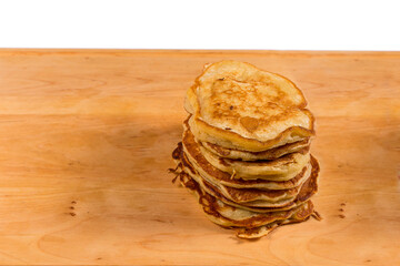 Delicious pancakes on a wooden table