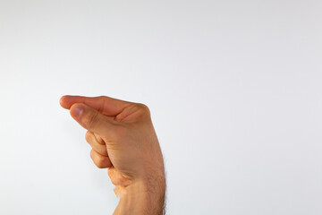 close up of a man's hand communicating with sign language, letters of the alphabet, on a white background