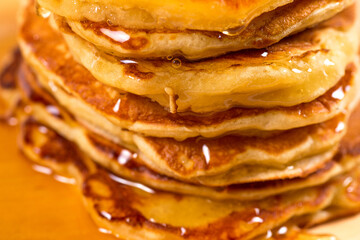 Delicious pancakes on a wooden table