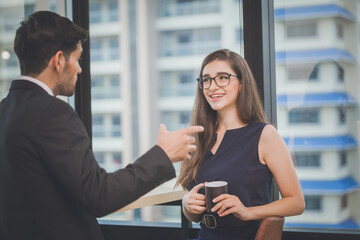 business people conference in modern meeting room. Cheerful coworkers in office during company meeting. Business young Relaxation  Break Concept