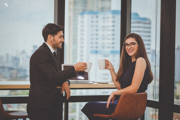 business people conference in modern meeting room. Cheerful coworkers in office during company meeting. Business young Relaxation  Break Concept