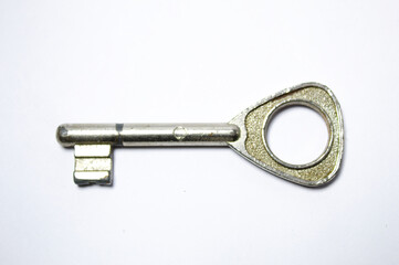 Silver key with old look and white background