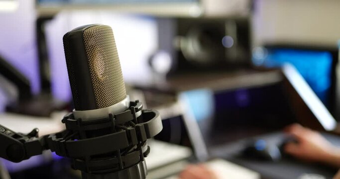 A high quality condenser microphone for a podcast in a music recording studio or livestream radio station.