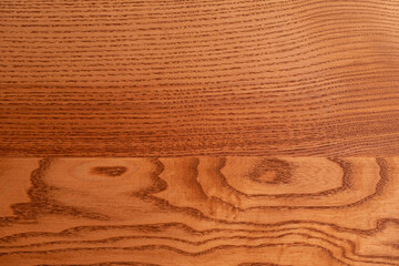The structure of natural ash wood, tinted oak. Hardwood. Creative vintage background. Imitation of aging.