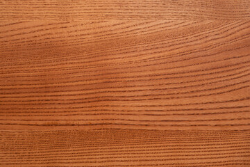 The structure of natural ash wood, tinted oak. Hardwood. Creative vintage background. Imitation of aging.