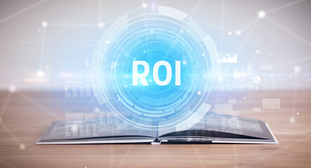 Open book with ROI abbreviation, modern technology concept