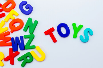 Colored letters in English on a white background