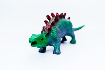 toy for children - dinosaur on a white background, isolated