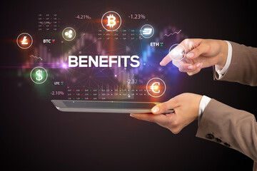 Close-up of a touchscreen with BENEFITS inscription, business opportunity concept