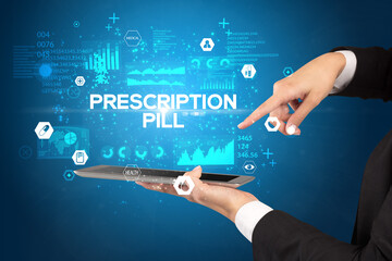 Close-up of a touchscreen with PRESCRIPTION PILL inscription, medical concept