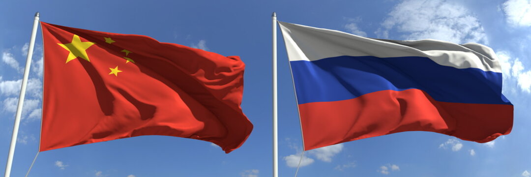 Flags of China and Russia on flagpoles. 3d rendering