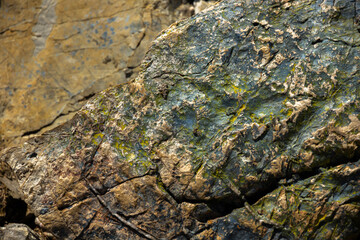 Texture of green stone cut with water