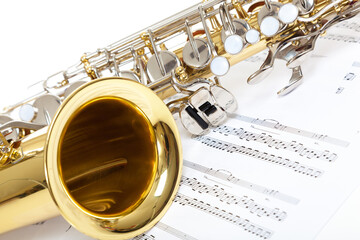 Obraz premium A close up of Saxophone with sheet music