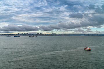 Panama City, Panama - November 30, 2008: Long shot, from the bay with ships anchored, of modern...