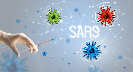 Obraz na płótnie Canvas Syringe, medical injection in hand with SARS inscription, coronavirus vaccine concept