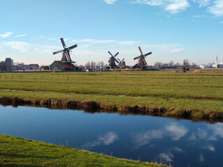 Fototapeta premium beautiful panorama of Zaanse Scans in the Netherlands. Windmills on ponds and streams