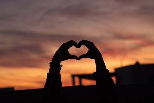 silhouette of a person at sunset