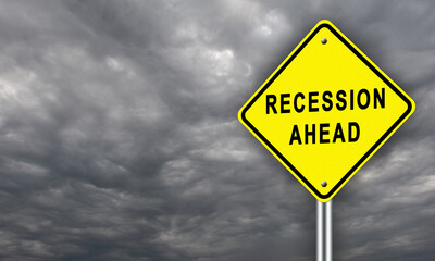 A warning about the onset of a recession. Warning road sign With the words Recession ahead. A warning sign against a gray sky. Space for text. Economic crisis.