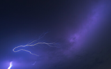 Lightning strikes the sky in rainy season