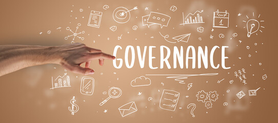 Close-Up of cropped hand pointing at GOVERNANCE inscription, modern business solution concept