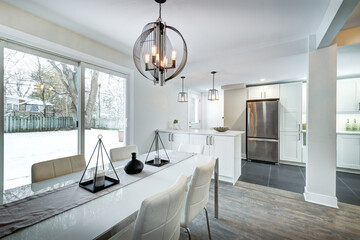 Real Estate Photography - Renovated furnished for sale house in Montreal's suburb with bathroom, basement and new kitchen
