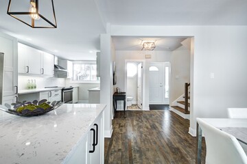 Real Estate Photography - Renovated furnished for sale house in Montreal's suburb with bathroom, basement and new kitchen
