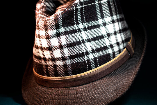Close Up of White and Brown Checkered Fedora