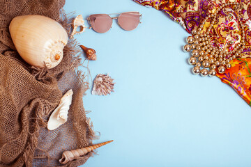 diverse travel girlish stuff on colorful background blue and yellow, nobody tourism lifestyle concept