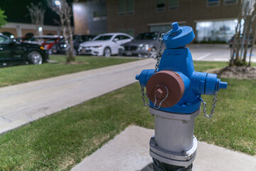 Blue hydrant in the parking lot