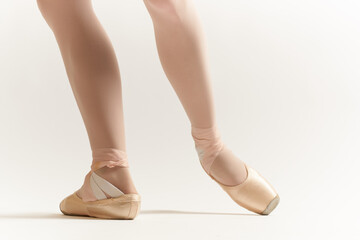 Ballerina's legs correct positioning of legs movement exercise tutu pointe shoes model