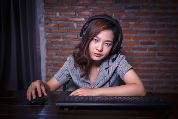 Asian Gamer girl woman nerdy geek casual playing video games computer angry rage mad confused upset...
