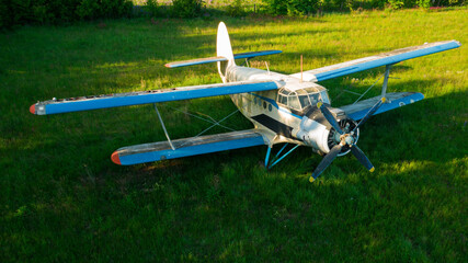 Old abandoned airport with planes. Fuselage, wings and engines. Top view