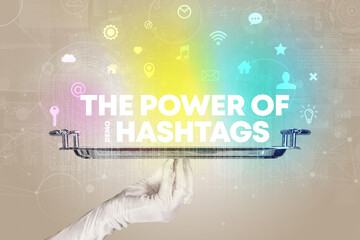 Fototapeta na wymiar Waiter serving social networking with THE POWER OF #HASHTAGS inscription, new media concept