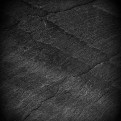 Dark grey black slate background or texture.