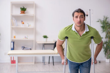 Young man waiting for doctor in the clinic