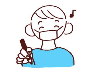 Obraz premium 笑顔でペンを持つマスク姿の若い男性