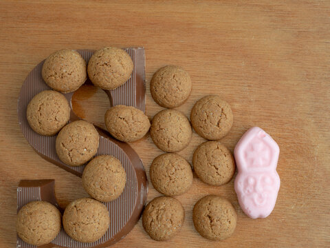 Composition for the dutch fest of Sinterklaas. With pepernoten and a chocolate letter S. Room for copy. 