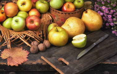 Autumn still life with apples and pears