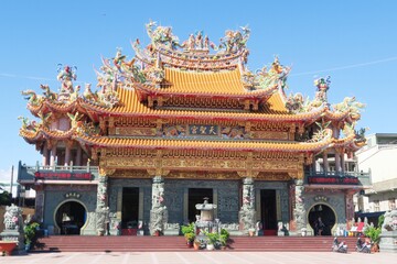 A magnificent Chinese Taoism temple in Cijin with colorful sculpture on the roof
