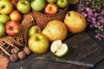 Autumn still life with apples and pears