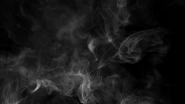 Texture of white smoke on a black background. Slow motion. Vape smoke. cigarette smoke clud.