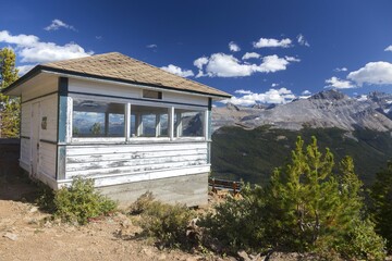 Obraz na płótnie Canvas Heritage Fire Lookout Wood Building Structure Exterior and Scenic Canadian Rocky Mountain Peaks Landscape, Yoho National Park, British Columbia, Canada