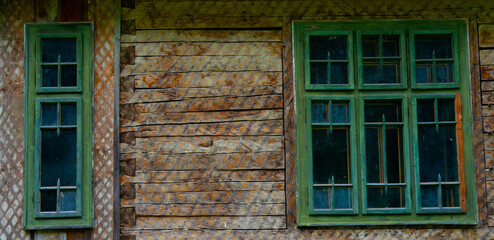 Fototapeta na wymiar wooden door and window of the traditional country house