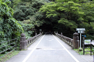 Fototapeta na wymiar Empty road and bridge around Takachiho Gorge