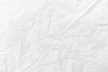 The background is white crumpled paper. Texture of paper with kinks and dents, old and dilapidated. wrinkle recycle paper texture background.