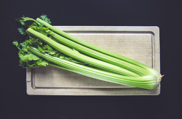 Celery branch bunch on a cutting board