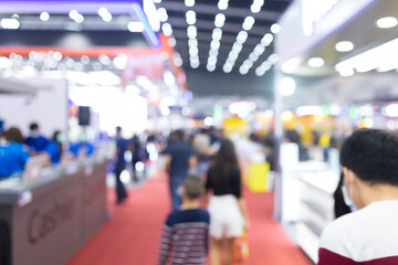 Abstract blur people in exhibition hall event trade show expo background. Business convention show,...