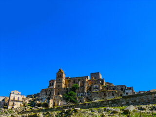 Fototapeta na wymiar Craco, Matera, Basilicata, Italy, view of the ghost town abandoned in 1963 due to natural disasters and now it represents a tourist attraction and a filming location
