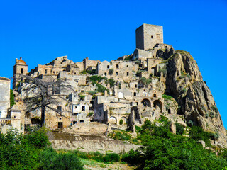 Fototapeta premium Craco, Matera, Basilicata, Italy, view of the ghost town abandoned in 1963 due to natural disasters and now it represents a tourist attraction and a filming location